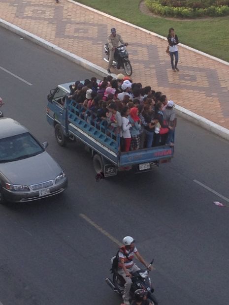 Phnom Penh Trucks with People