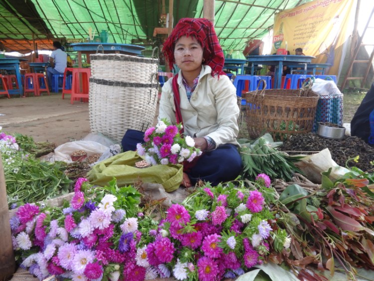 Lady wearing Thanaka in Myanmar AKA Burma
